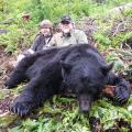 James Jr with his monster boar taken within shooting distance from James III big bear
